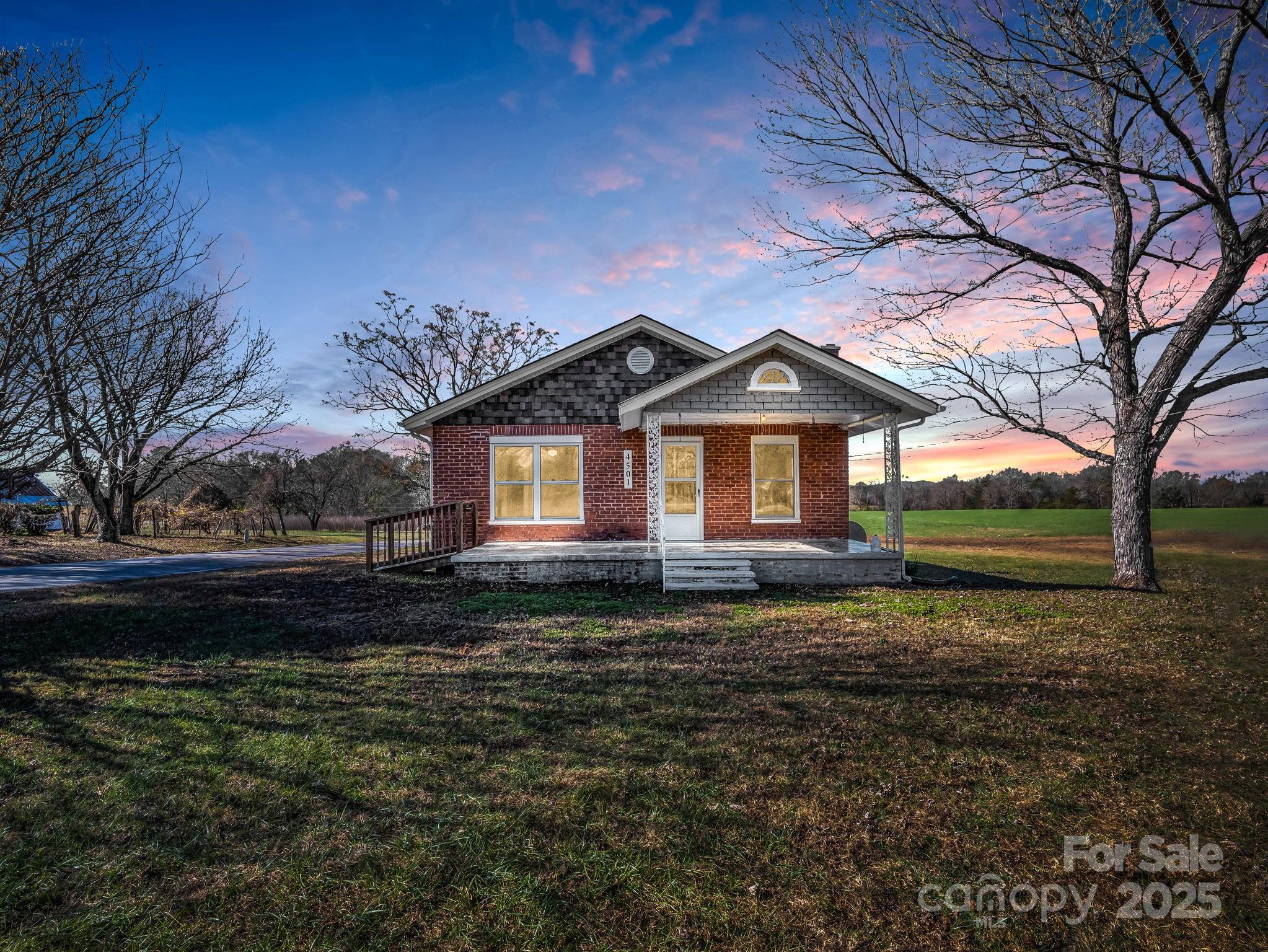 4501 Polkville Road Shelby, NC 28150 - Photo 1 of 35 a front view of a house with a yard