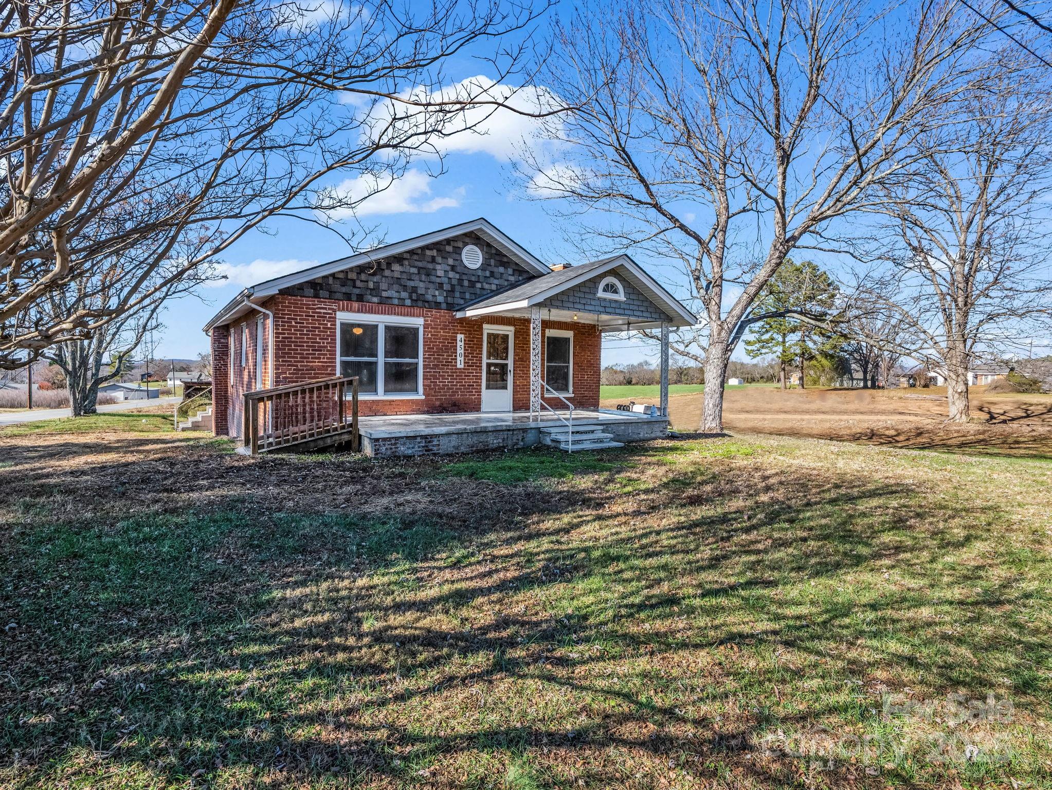 4501 Polkville Road Shelby, NC 28150 - Photo 2 of 35 a front view of a house with a yard