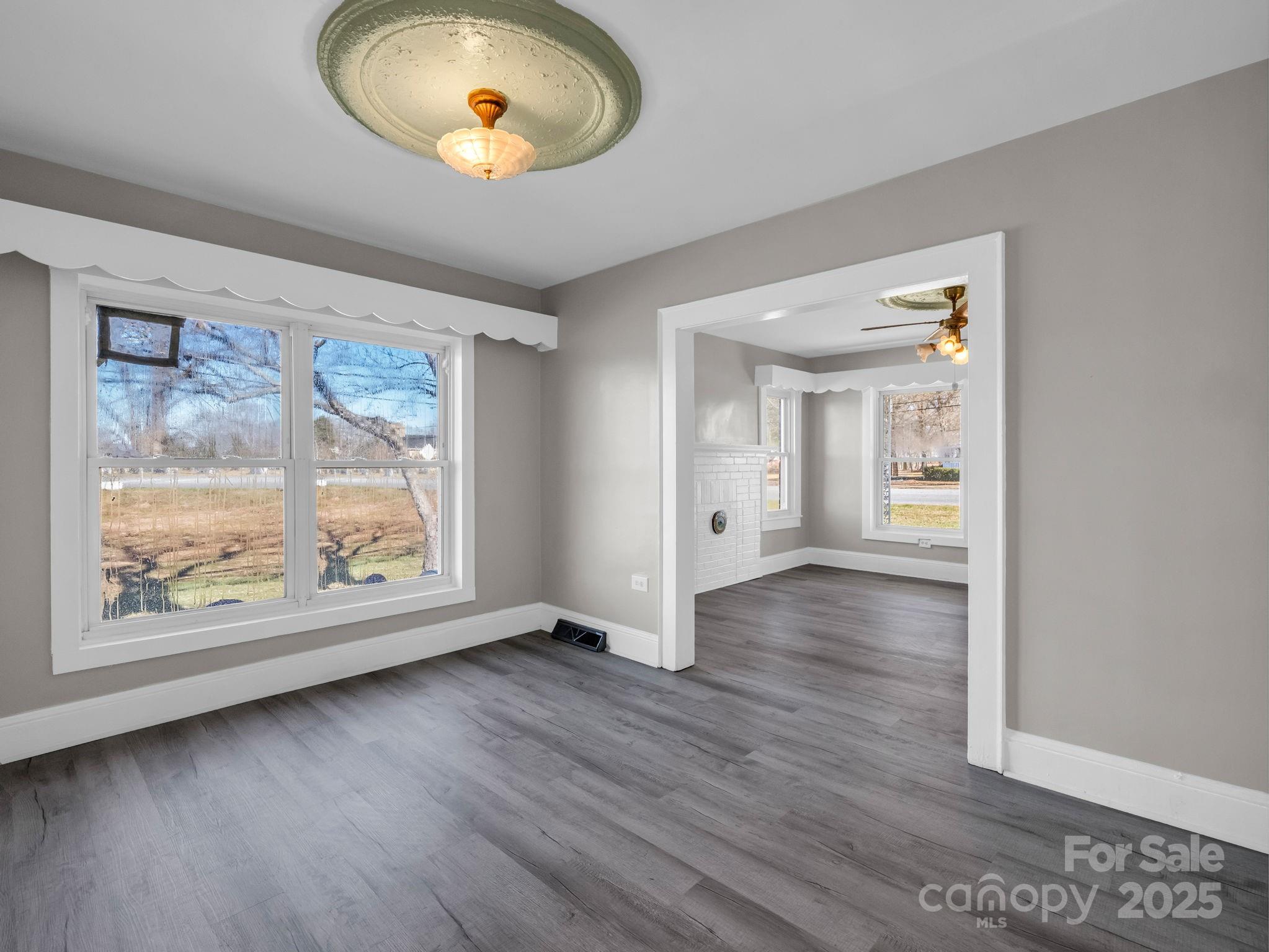 4501 Polkville Road Shelby, NC 28150 - Photo 6 of 35 wooden floor in an empty room with a window