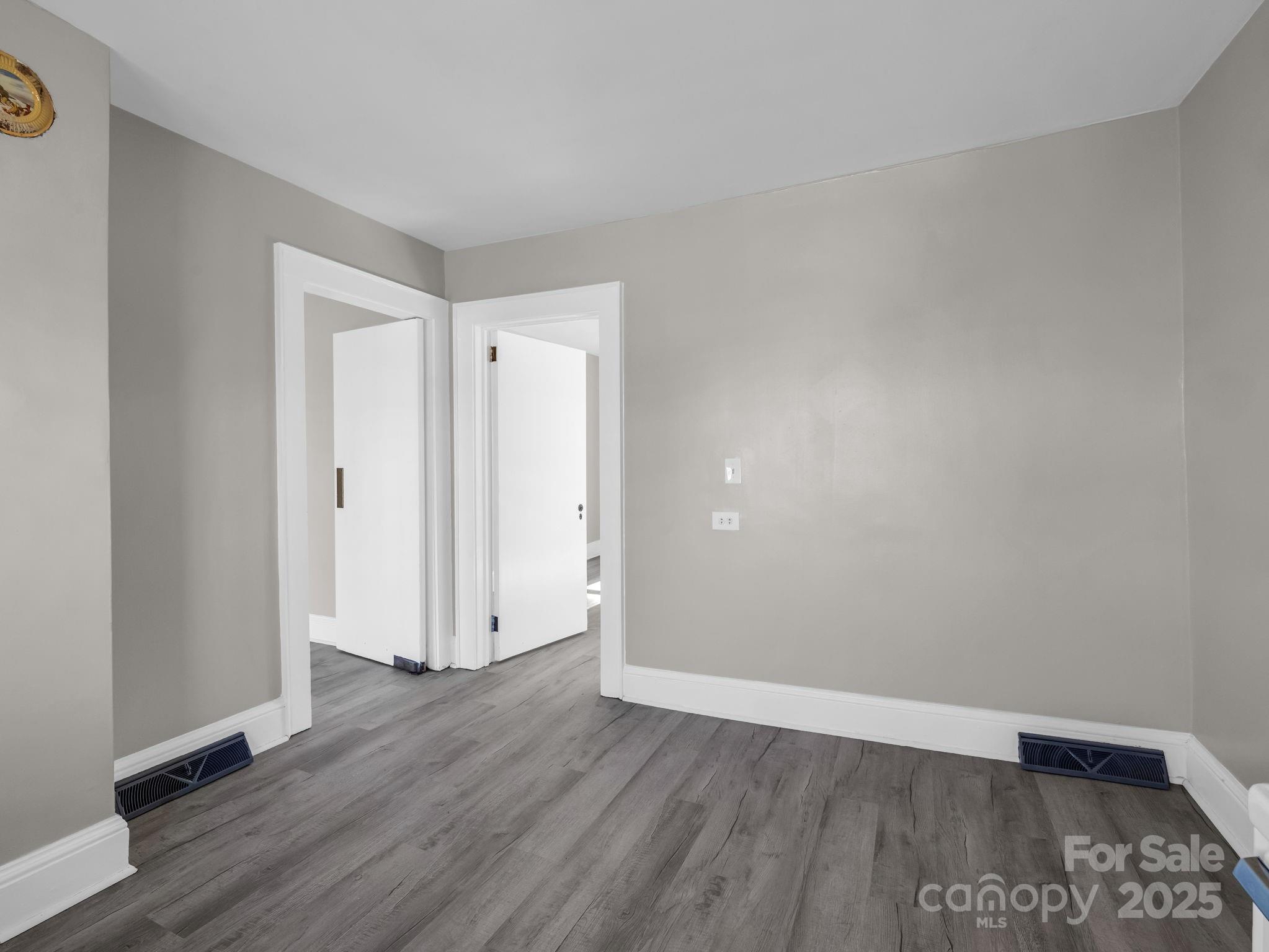 4501 Polkville Road Shelby, NC 28150 - Photo 9 of 35 a view of an empty room and wooden floor