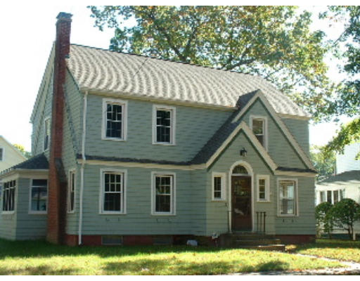 127 Manchester Terrace Springfield, MA 01108 - Photo 1 of 2 a front view of a house with a yard