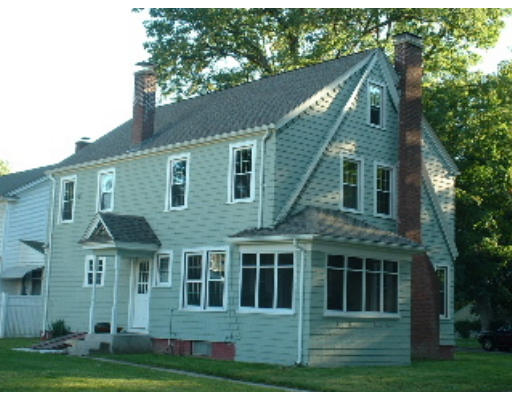 127 Manchester Terrace Springfield, MA 01108 - Photo 2 of 2 a front view of a house with a yard
