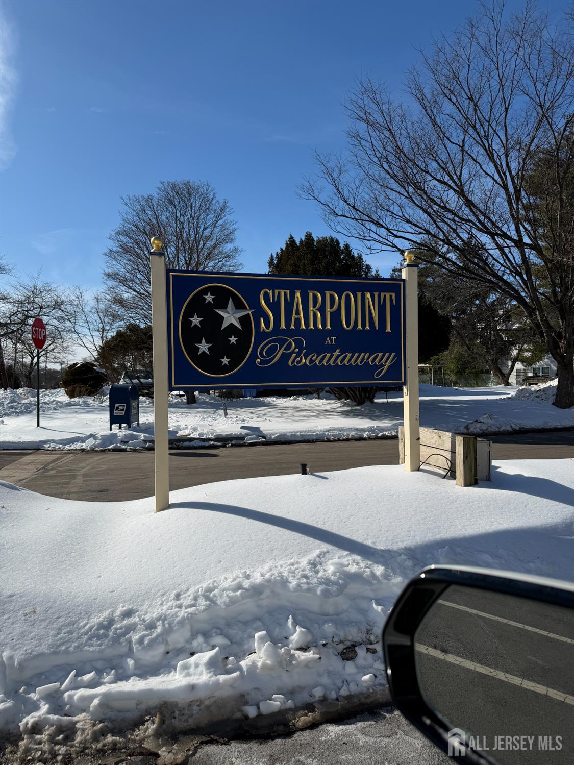 a view of a street with a building in the background