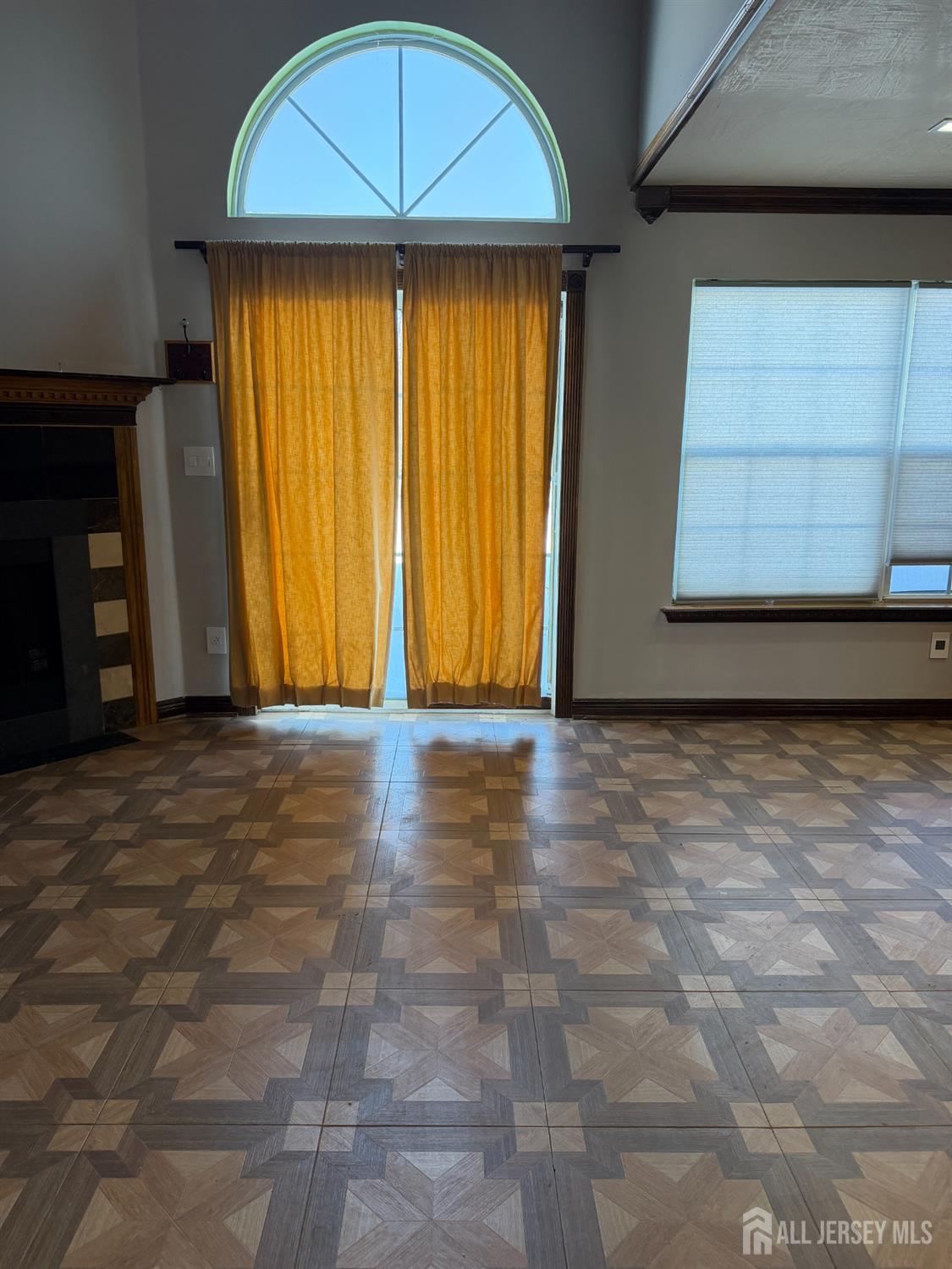 176 Nebula Road Piscataway, NJ 08854 - Photo 12 of 22 a view of a room with wooden floor and a window