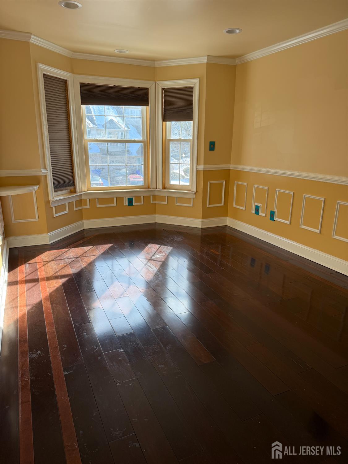 176 Nebula Road Piscataway, NJ 08854 - Photo 18 of 22 a view of an empty room with wooden floor and a window