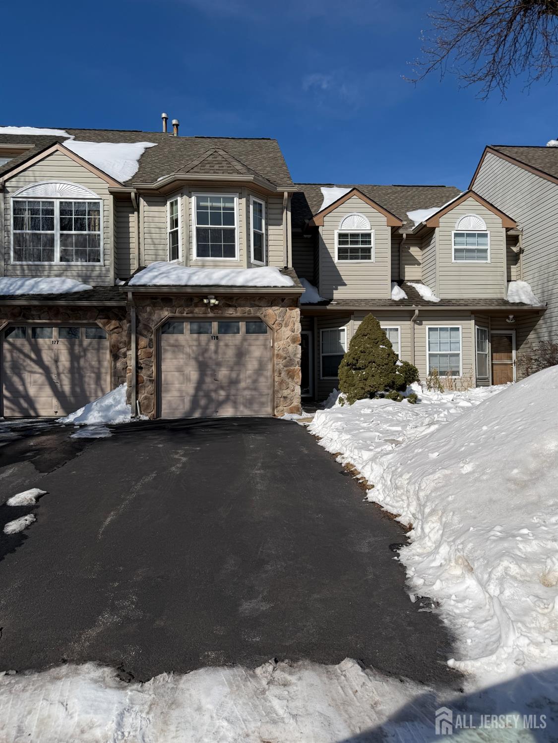 176 Nebula Road Piscataway, NJ 08854 - Photo 2 of 22 a front view of residential houses with yard
