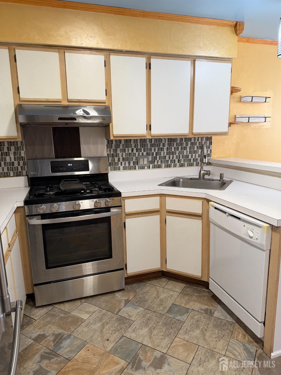 176 Nebula Road Piscataway, NJ 08854 - Photo 7 of 22 a kitchen with a stove and a sink