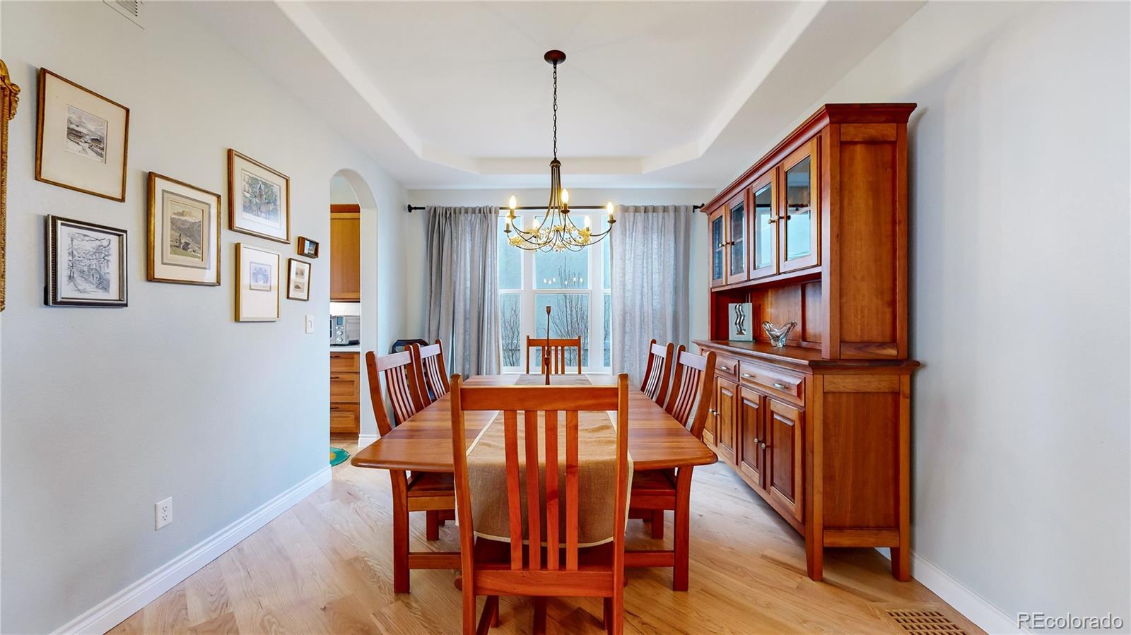 8400 Quaker Circle Arvada, CO 80007 - Photo 15 of 50 a view of a dining room with furniture and window