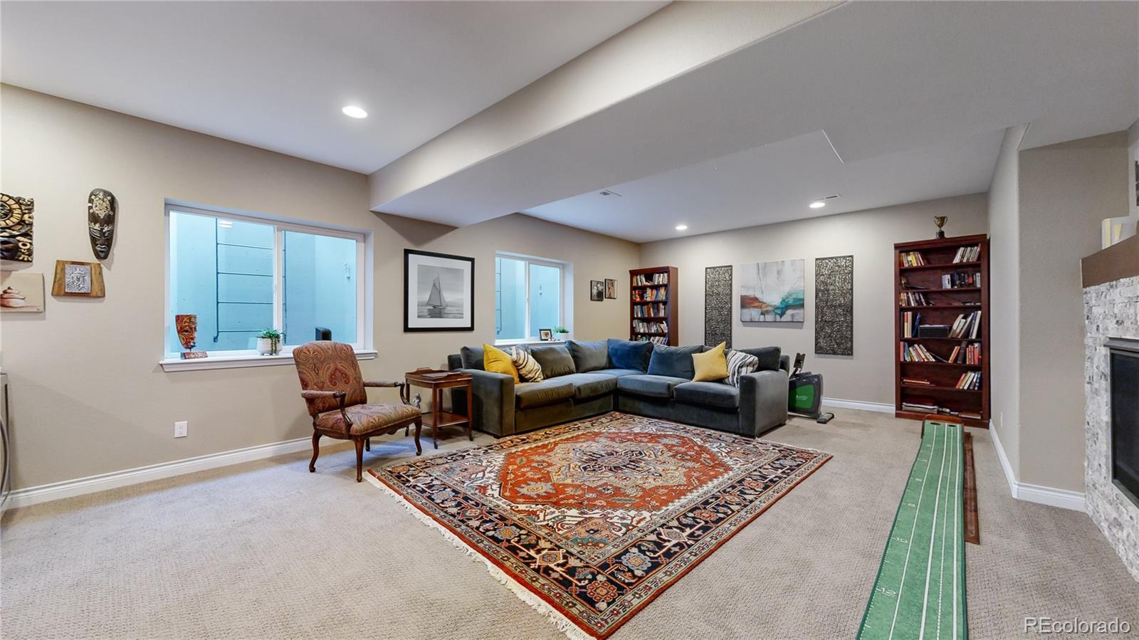 8400 Quaker Circle Arvada, CO 80007 - Photo 23 of 50 a living room with furniture rug and window