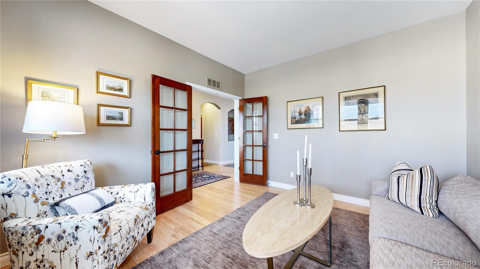 8400 Quaker Circle Arvada, CO 80007 - Photo 28 of 50 a bedroom with furniture and wooden floor