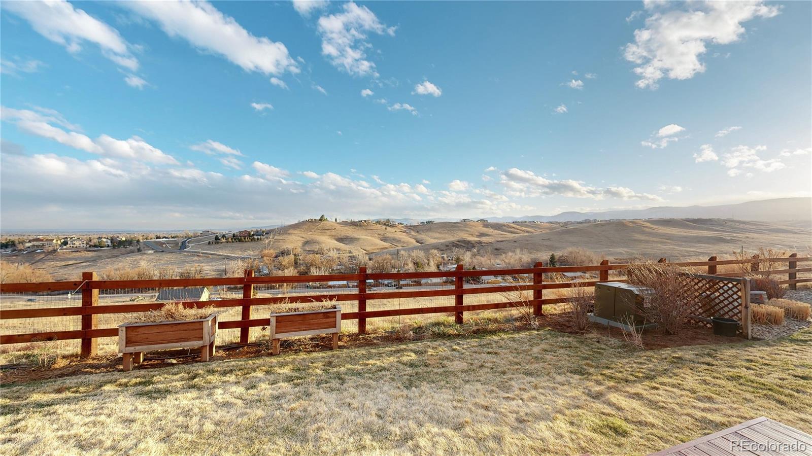 8400 Quaker Circle Arvada, CO 80007 - Photo 3 of 50 a view of a lake with a mountain