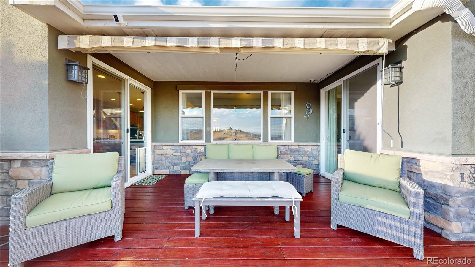 8400 Quaker Circle Arvada, CO 80007 - Photo 41 of 50 a living room with furniture and a large window