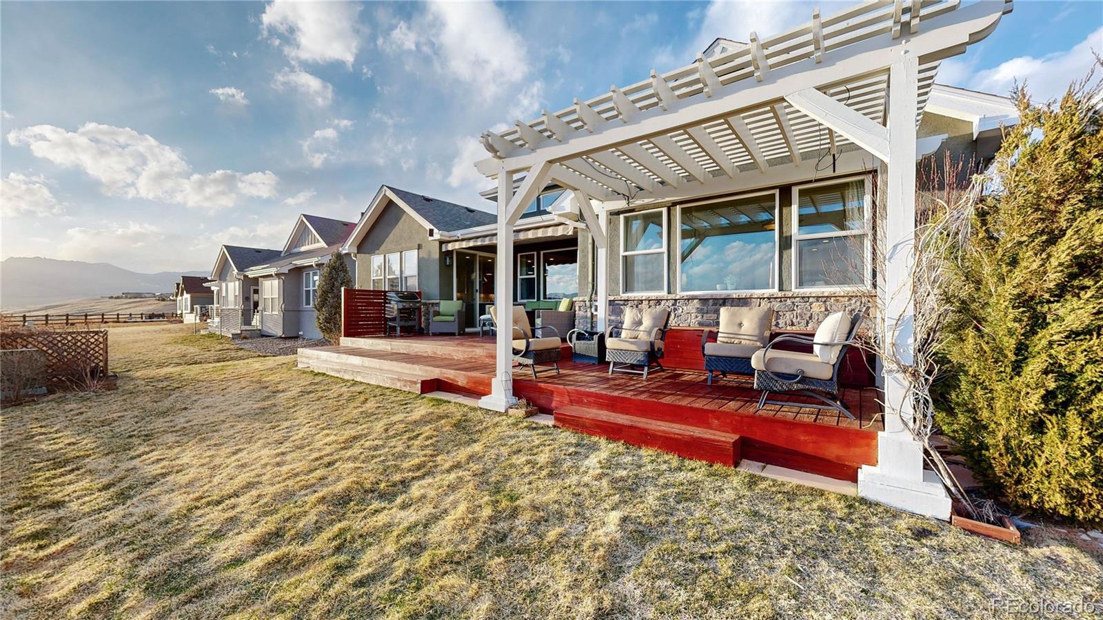 8400 Quaker Circle Arvada, CO 80007 - Photo 42 of 50 a view of a house with swimming pool and sitting area