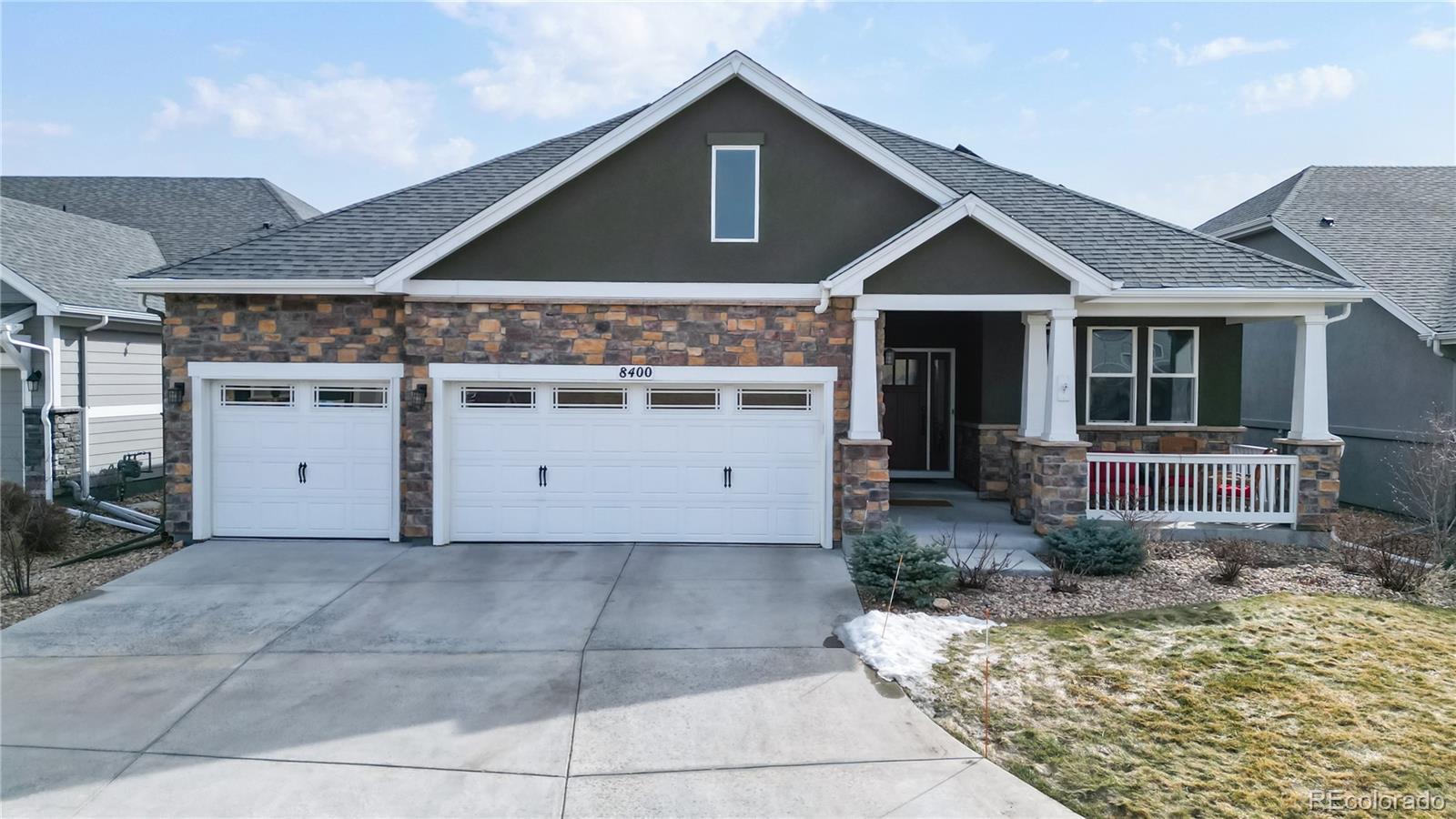 8400 Quaker Circle Arvada, CO 80007 - Photo 45 of 50 a front view of a house with a yard