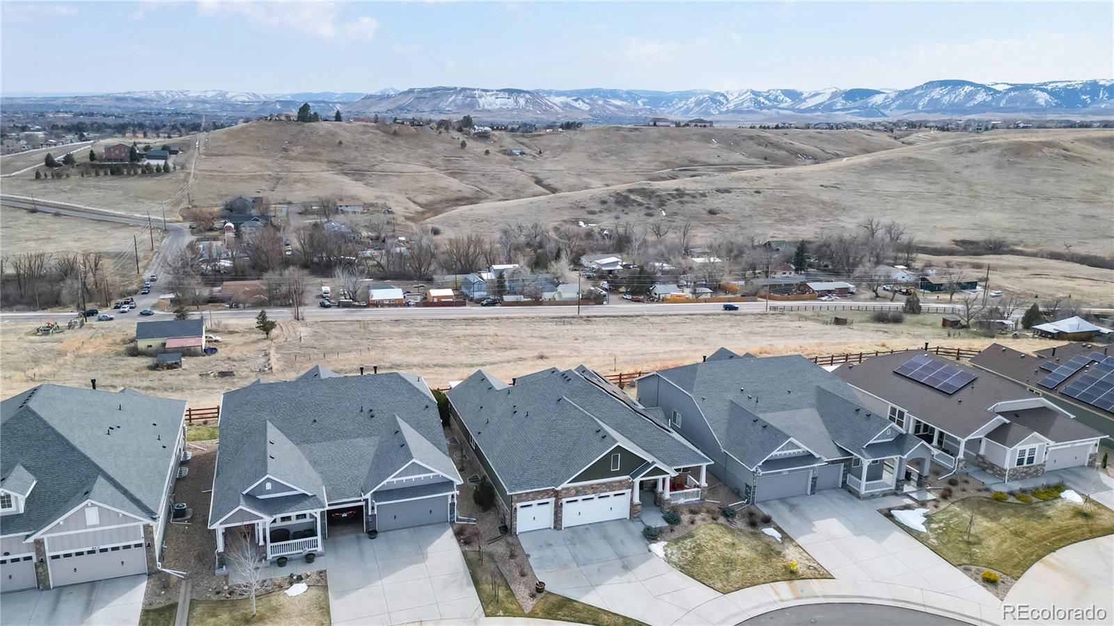 8400 Quaker Circle Arvada, CO 80007 - Photo 48 of 50 a view of a lake with a mountain in the background
