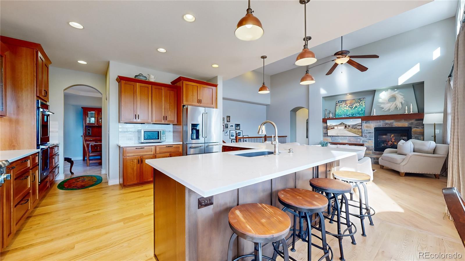 8400 Quaker Circle Arvada, CO 80007 - Photo 6 of 50 a large kitchen with a table and chairs