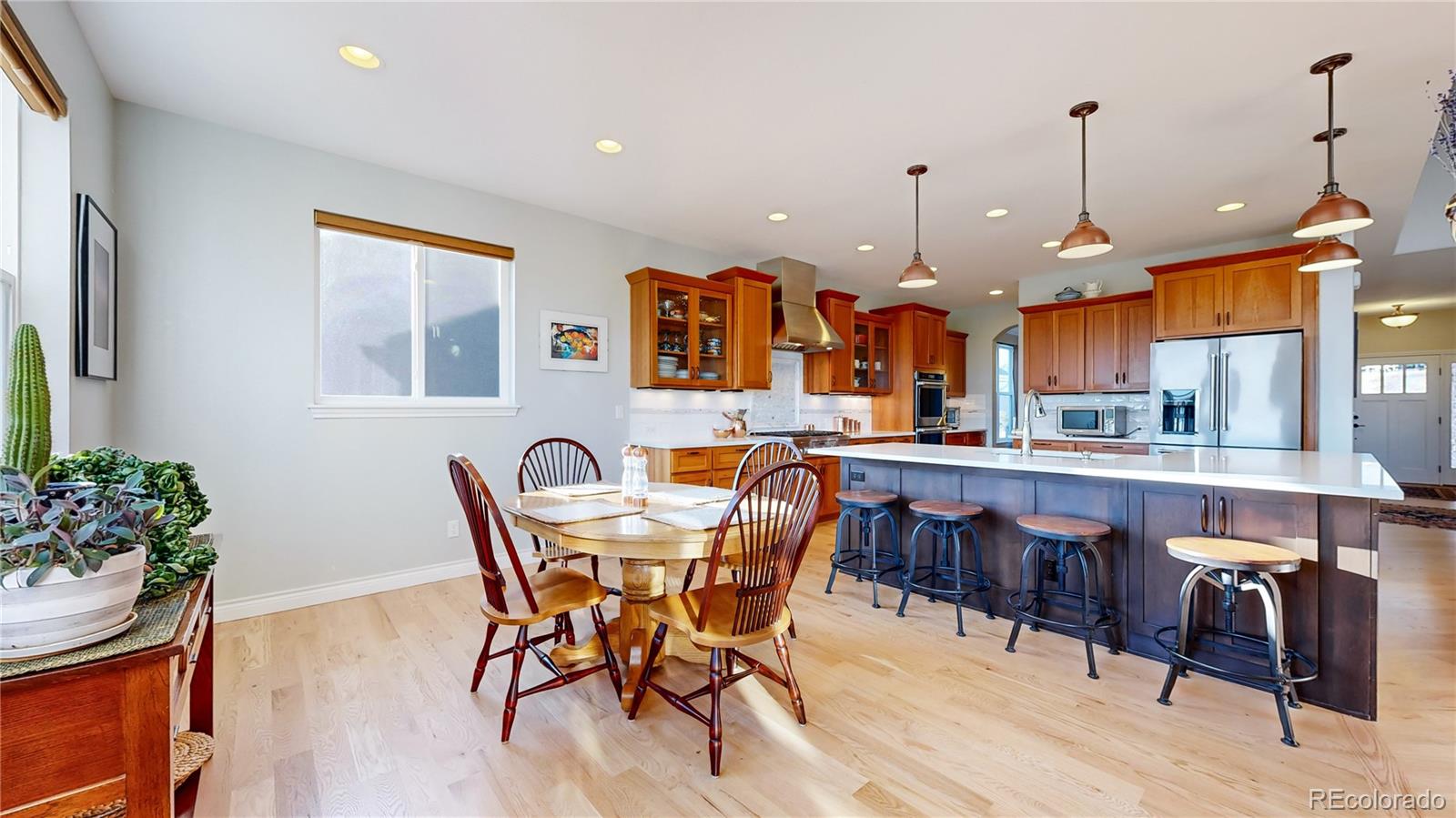 8400 Quaker Circle Arvada, CO 80007 - Photo 7 of 50 a dining room with furniture and window