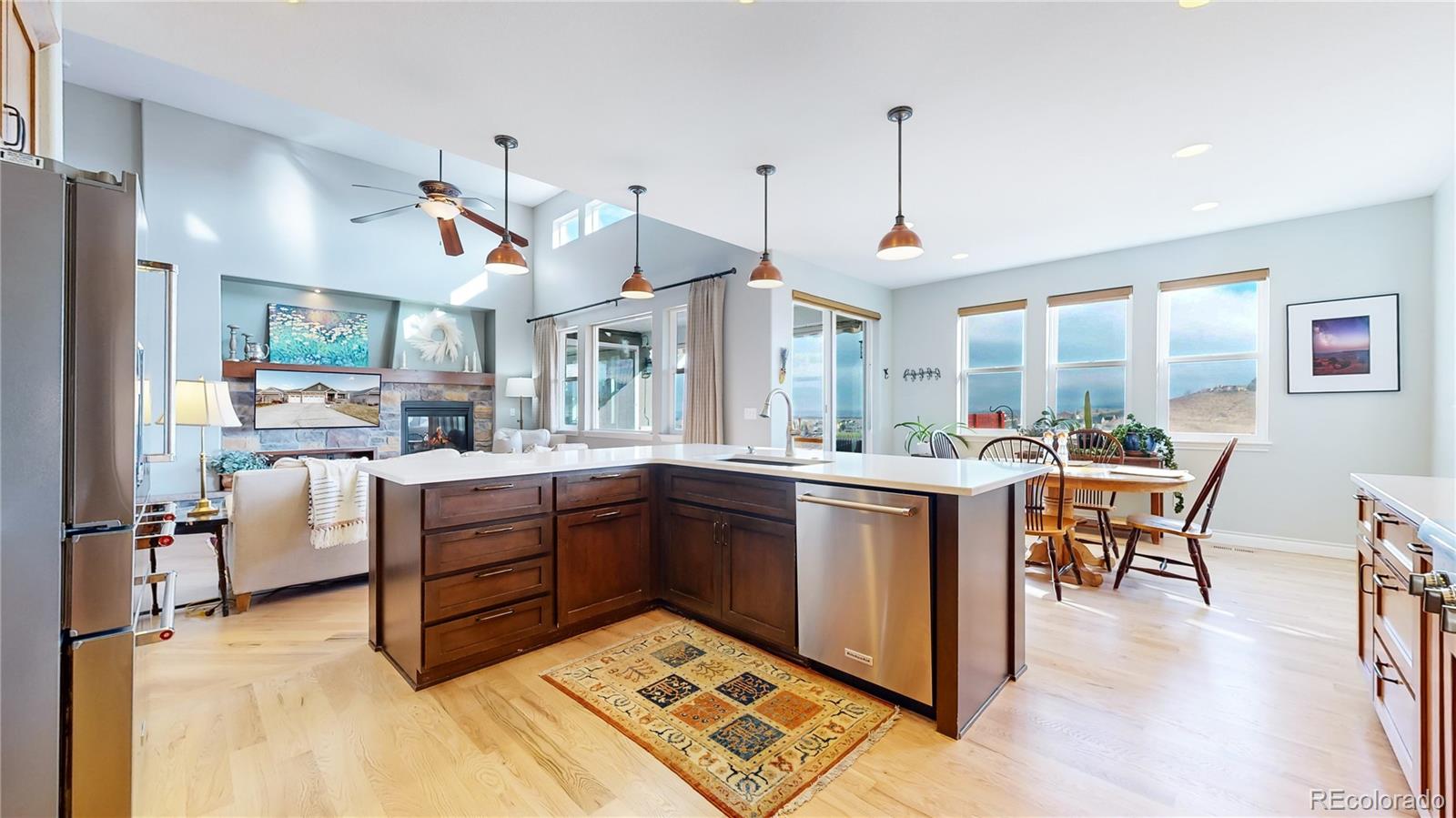 8400 Quaker Circle Arvada, CO 80007 - Photo 8 of 50 a kitchen with cabinets a sink and appliances