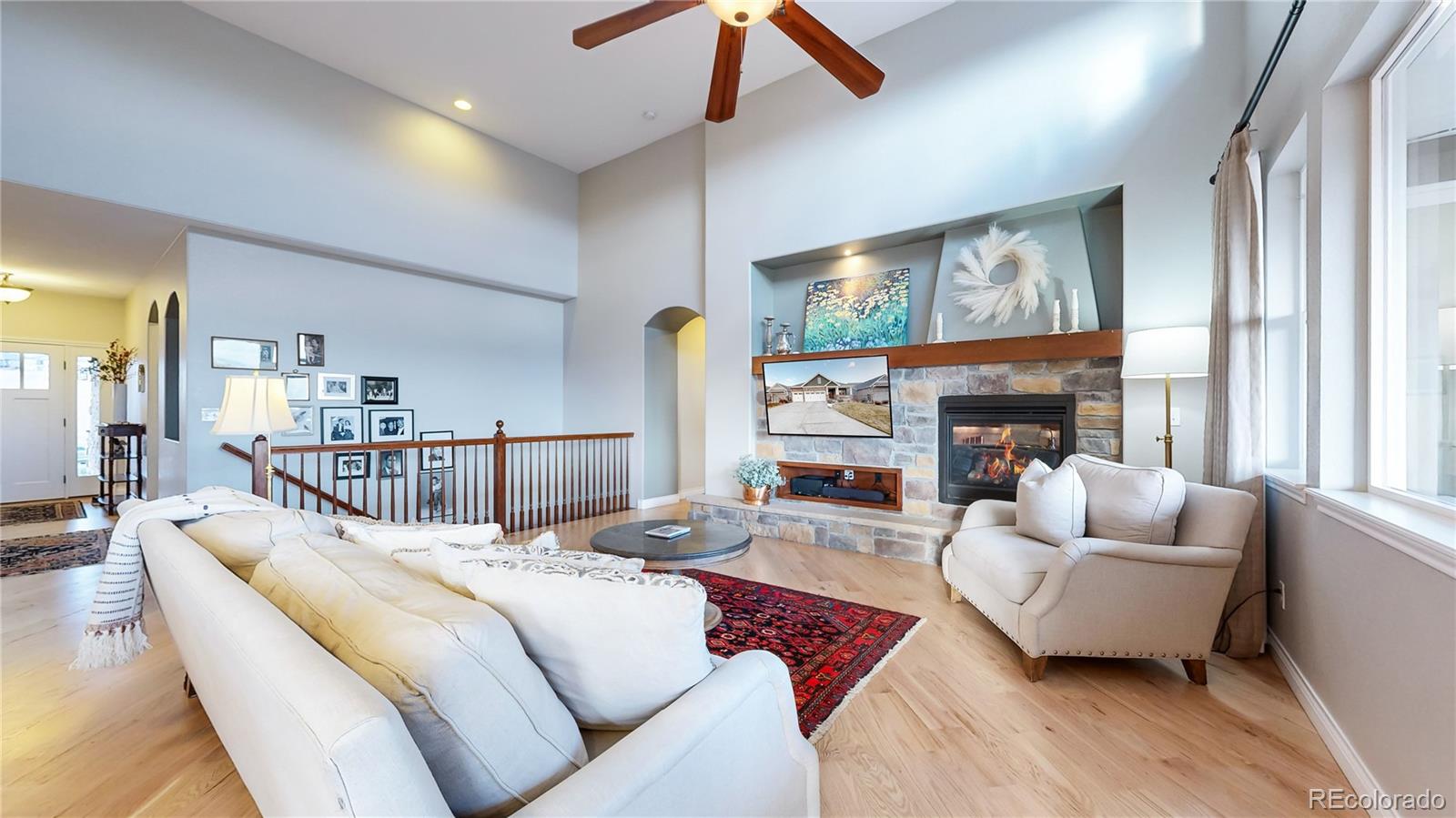 8400 Quaker Circle Arvada, CO 80007 - Photo 10 of 50 a bedroom with furniture and a fireplace