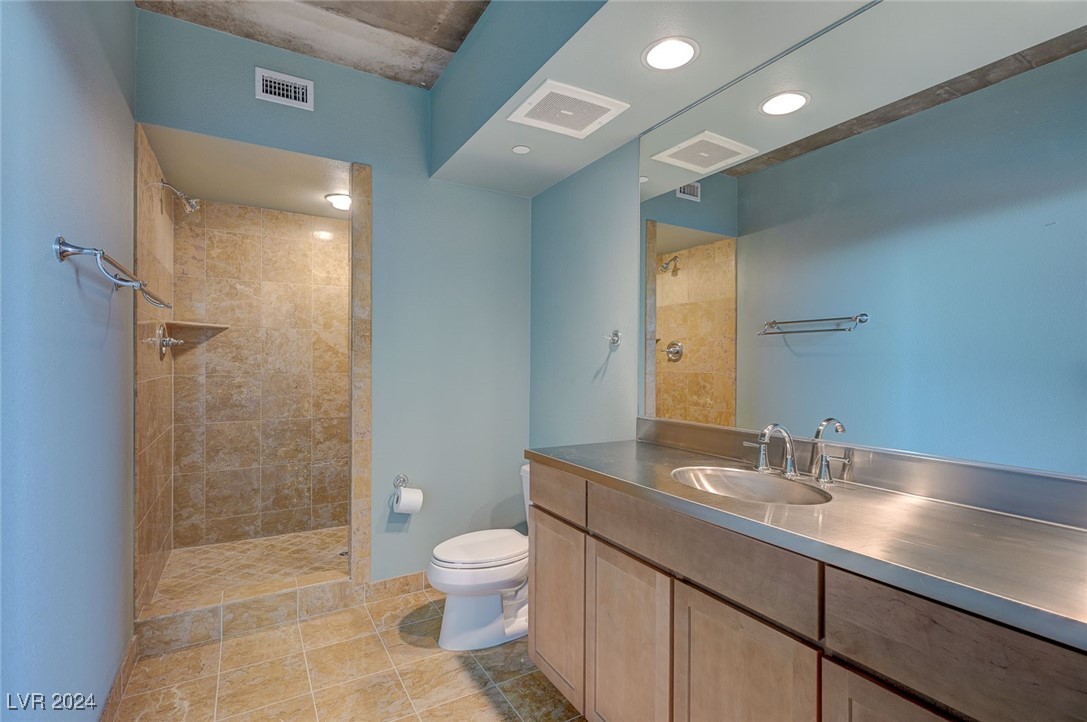 360 East Desert Inn Road, Unit 1007 Las Vegas, NV 89109 - Photo 41 of 50 Guest Bathroom downstairs