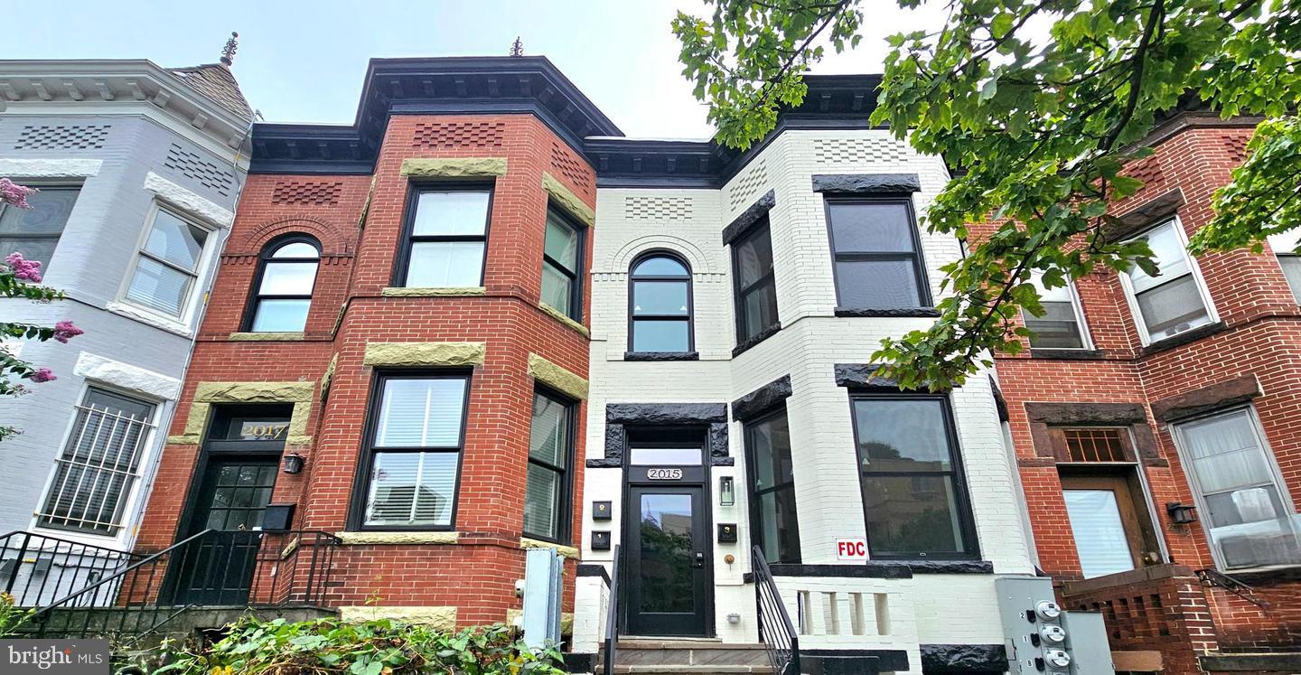 a front view of a multi story residential apartment building