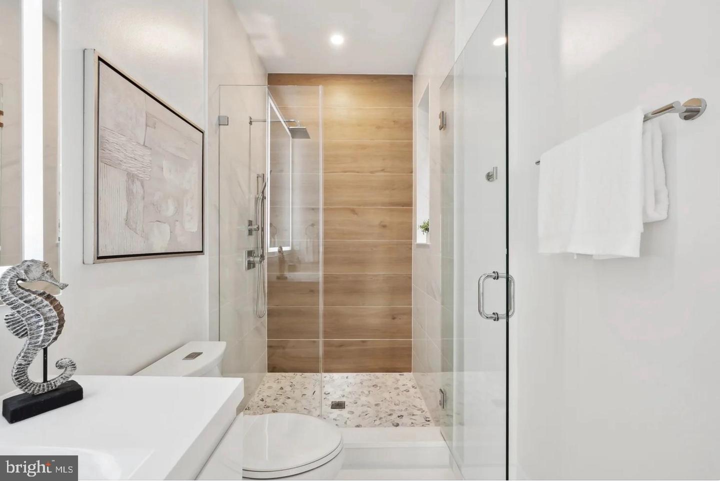 2015 13th Street Northwest, Unit 2 Washington, DC 20009 - Photo 26 of 42 a bathroom with a sink toilet and shower