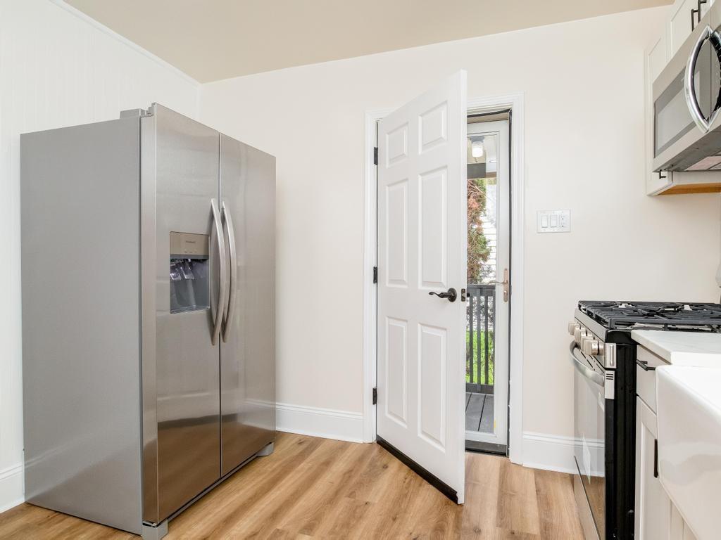 1660 Mercer Road Ellwood City, PA 16117 - Photo 16 of 41 a view of kitchen with stainless steel appliances wooden floor