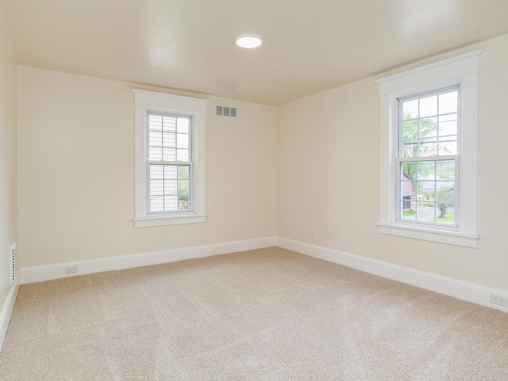 1660 Mercer Road Ellwood City, PA 16117 - Photo 22 of 41 an empty room with windows
