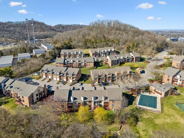 a view of a town with mountains in the background