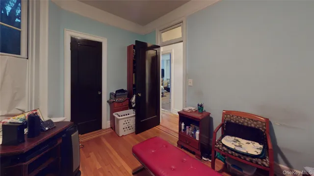 a living room with furniture a desk and chair