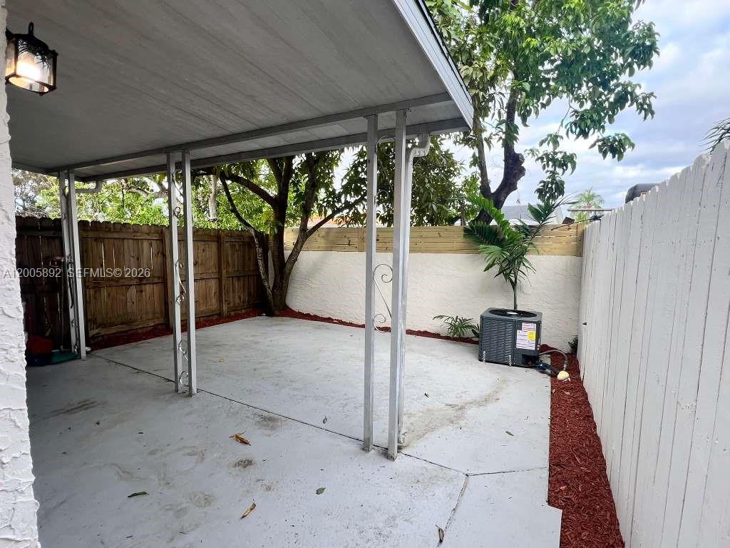 3632 Southwest 112th Avenue, Unit 63 Miami, FL 33165 - Photo 14 of 14 a view of a porch