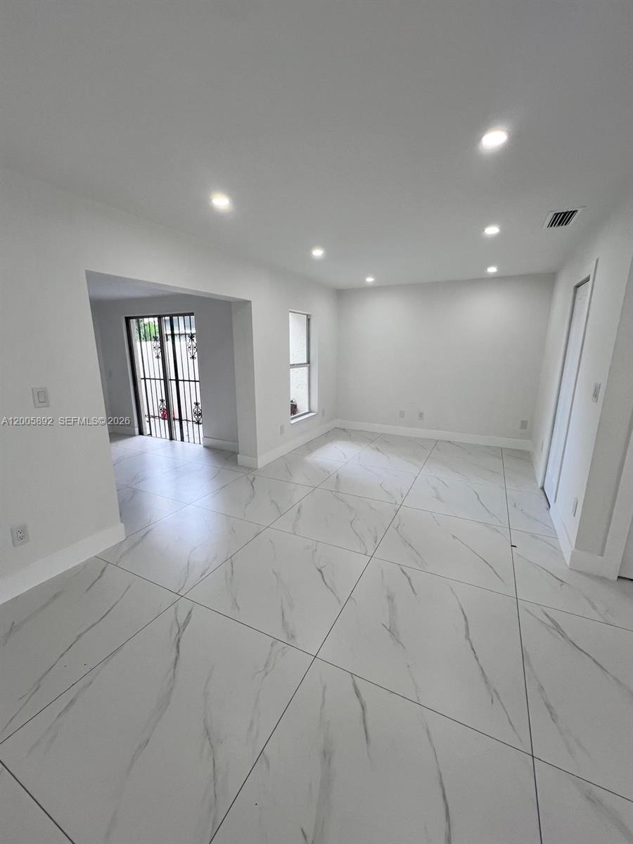 3632 Southwest 112th Avenue, Unit 63 Miami, FL 33165 - Photo 3 of 14 a view of an empty room
