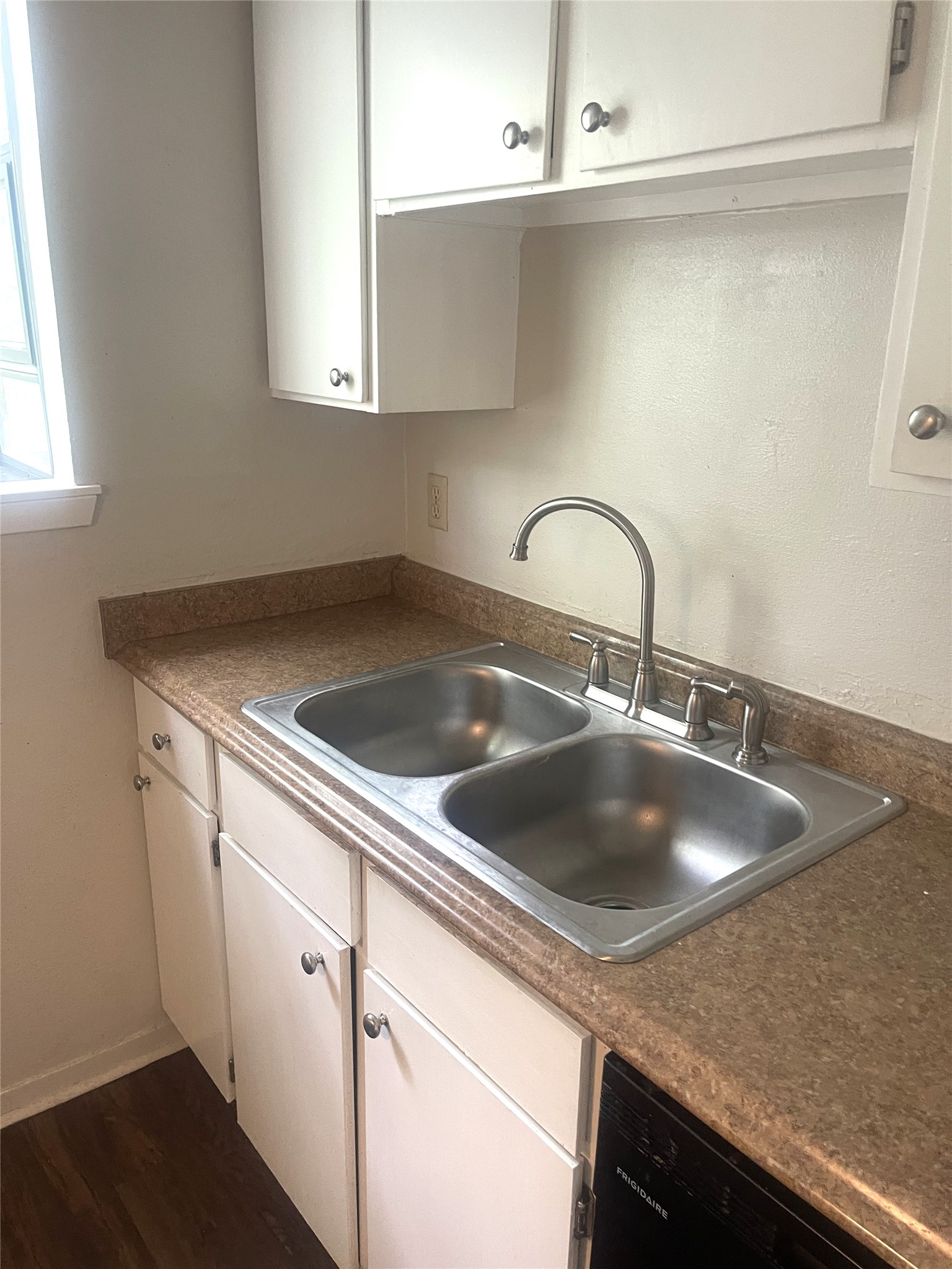 2005 West Loop, Unit D1 Austin, TX 78758 - Photo 21 of 31 a close view of sink and tap