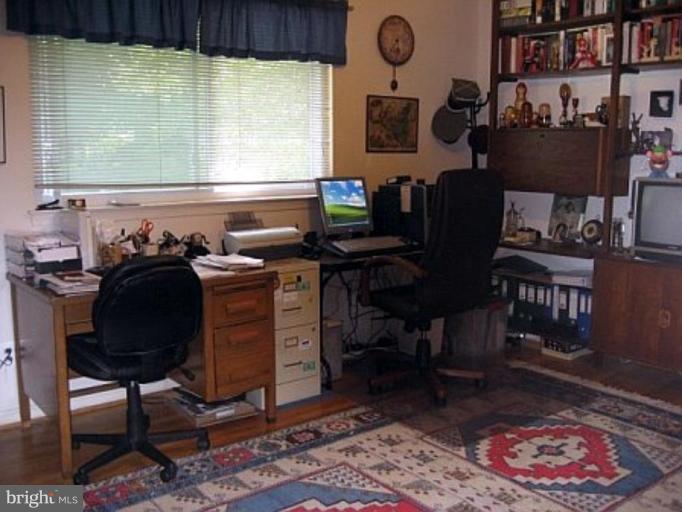 8417 Thames Street Springfield, VA 22151 - Photo 9 of 16 a view of a workspace with furniture