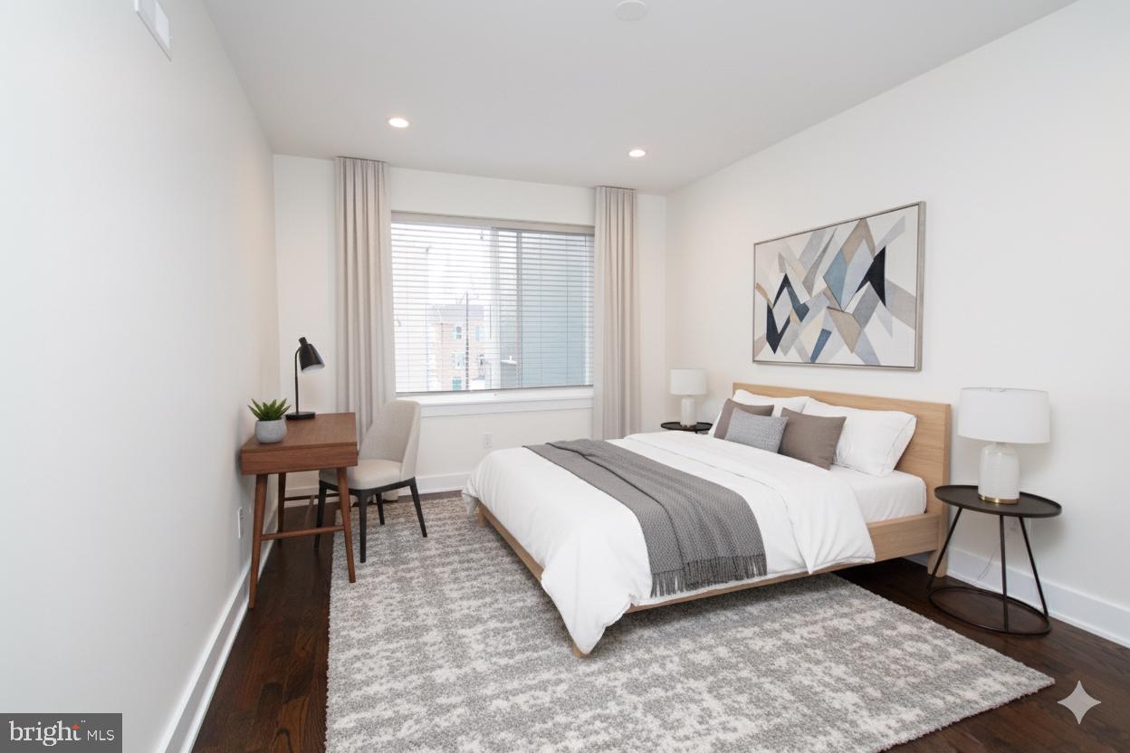 1022 South 2nd Street, Unit 4 Philadelphia, PA 19147 - Photo 15 of 50 a bedroom with a large bed and a window