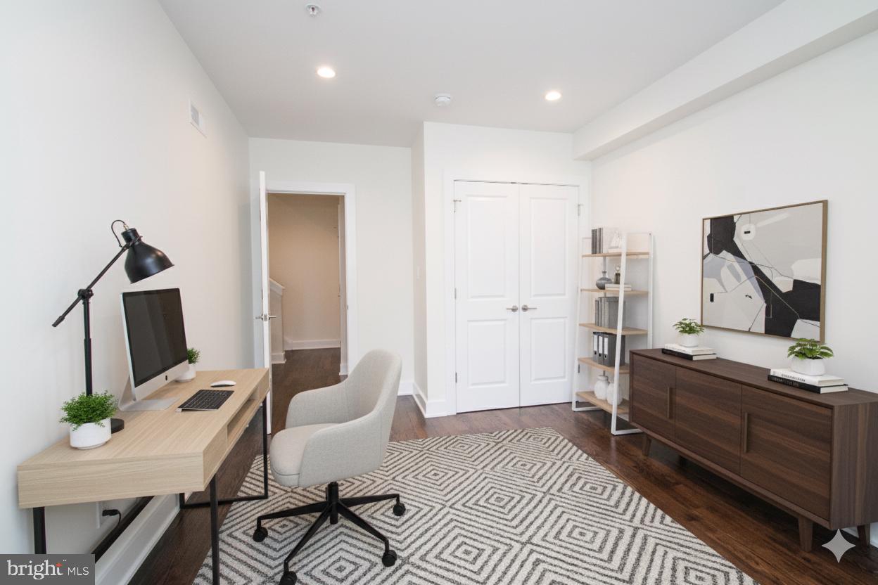 1022 South 2nd Street, Unit 4 Philadelphia, PA 19147 - Photo 19 of 50 a living room with furniture a rug and a chandelier
