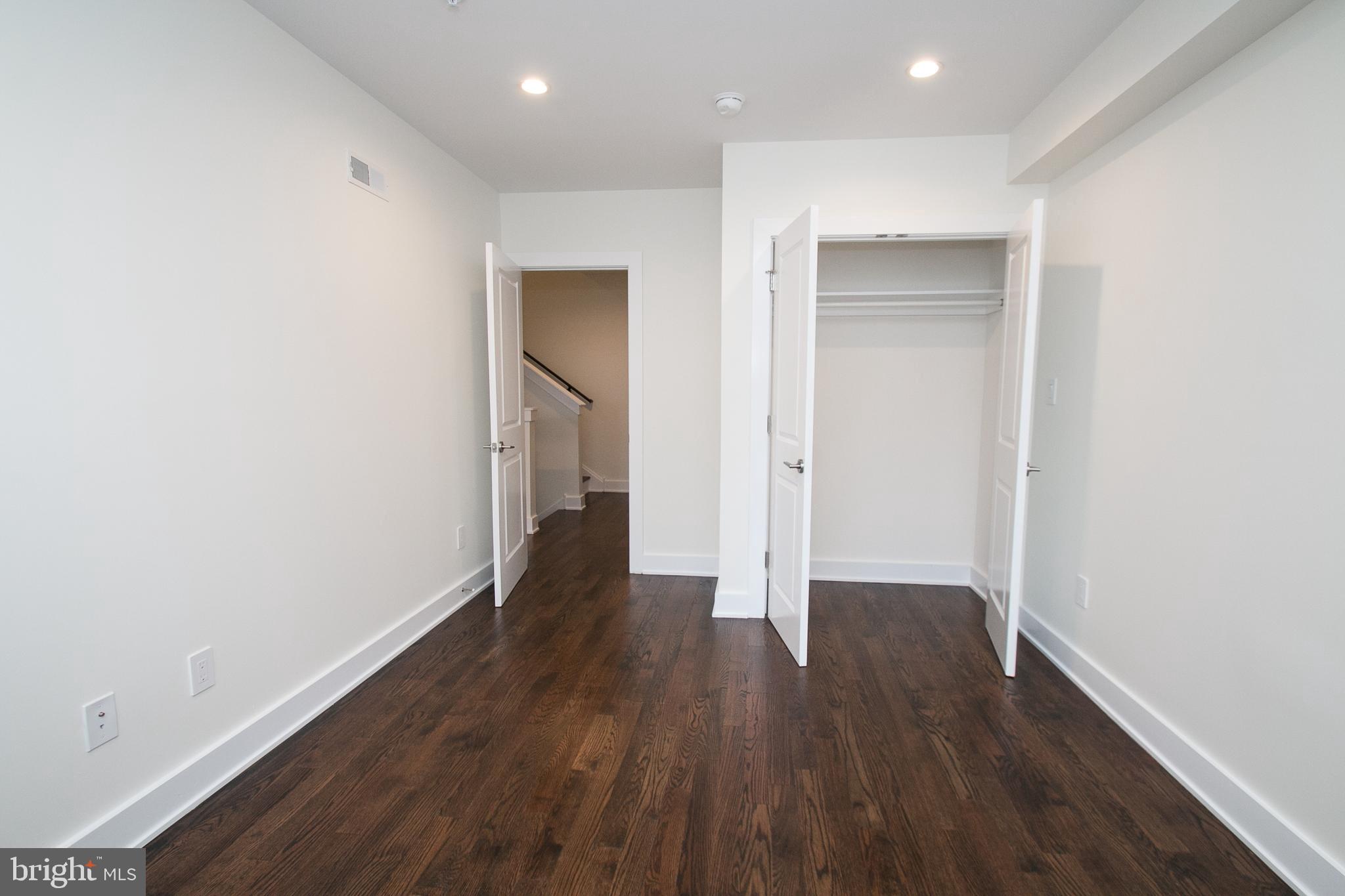 1022 South 2nd Street, Unit 4 Philadelphia, PA 19147 - Photo 21 of 50 a view of a hallway with wooden floor
