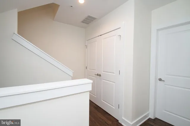 a view of an empty walk in closet
