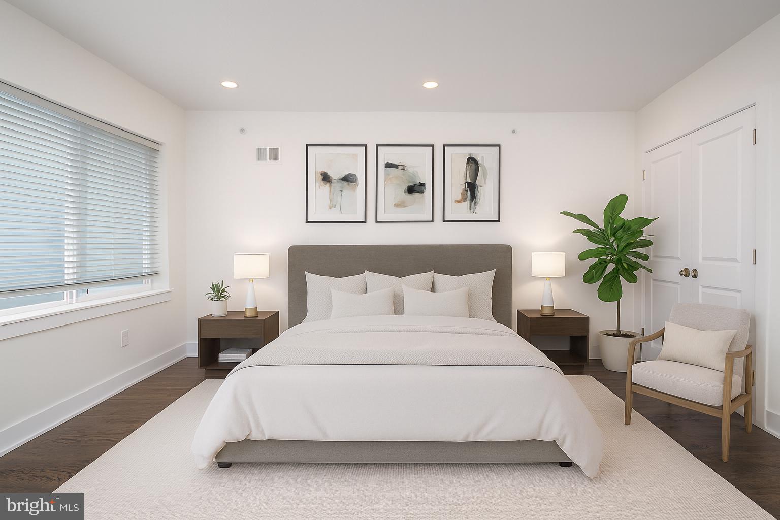 1022 South 2nd Street, Unit 4 Philadelphia, PA 19147 - Photo 28 of 50 a bedroom with a large bed and a couch