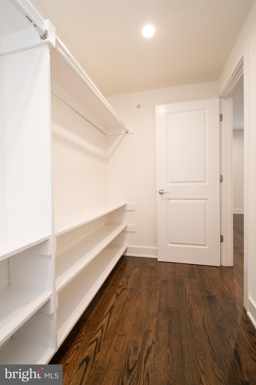 1022 South 2nd Street, Unit 4 Philadelphia, PA 19147 - Photo 34 of 50 a view of walk in closet with wooden floor