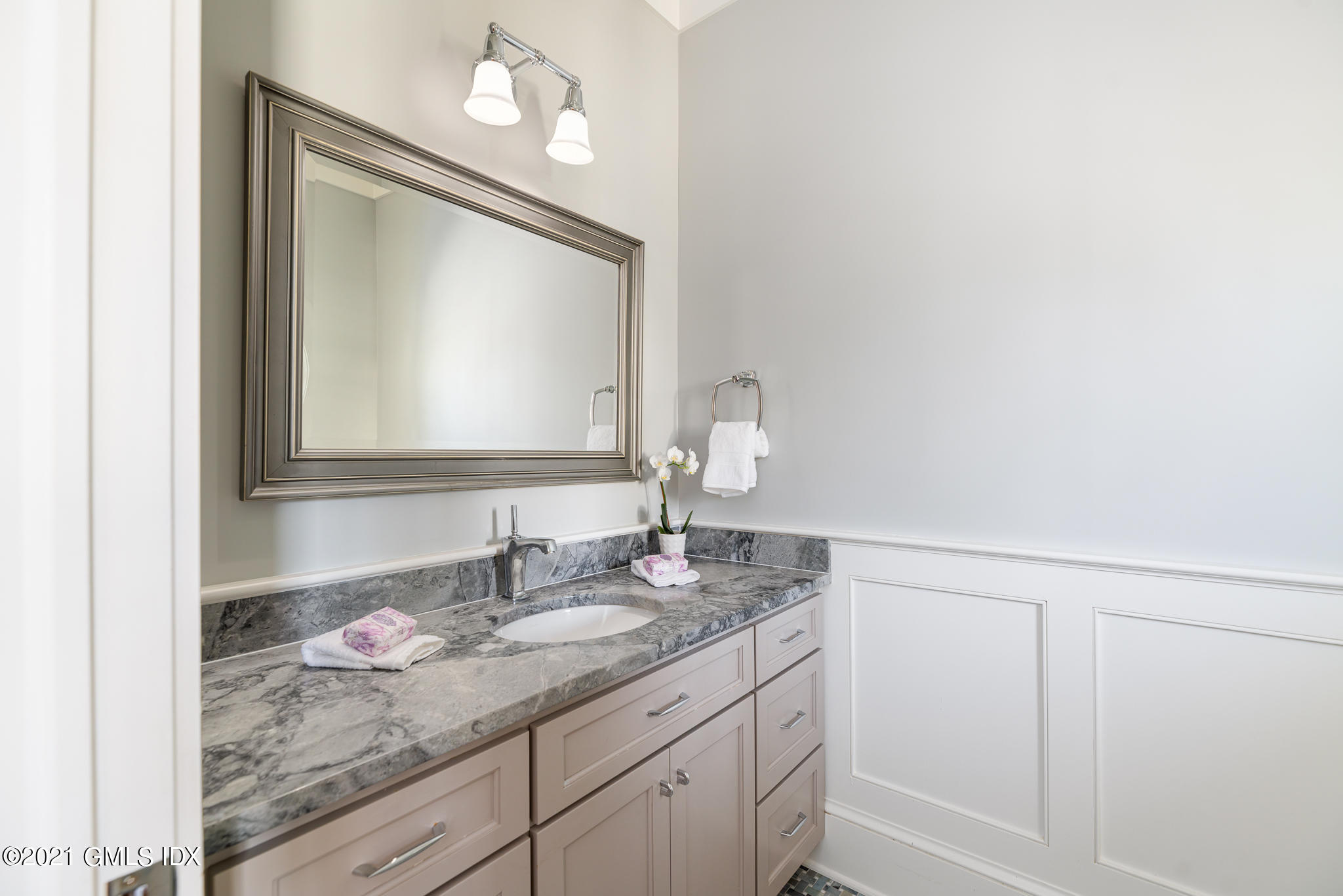 5 Gilliam Lane Riverside, CT 06878 - Photo 14 of 46 a bathroom with a granite countertop sink and a mirror