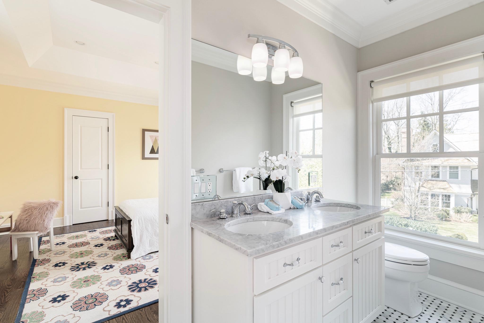 5 Gilliam Lane Riverside, CT 06878 - Photo 22 of 46 a bathroom with a sink a toilet and a mirror