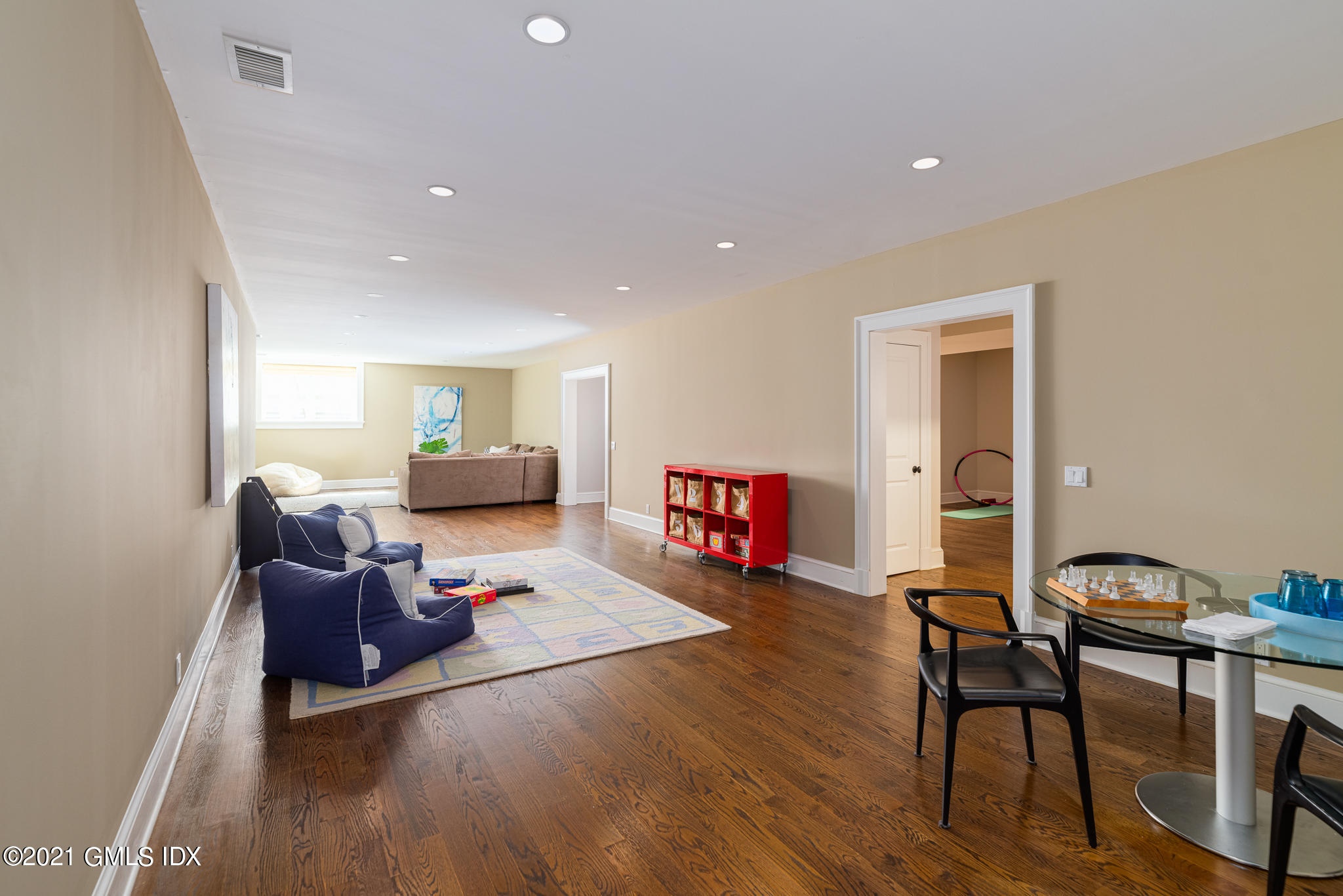 5 Gilliam Lane Riverside, CT 06878 - Photo 31 of 46 a living room with furniture and a wooden floor