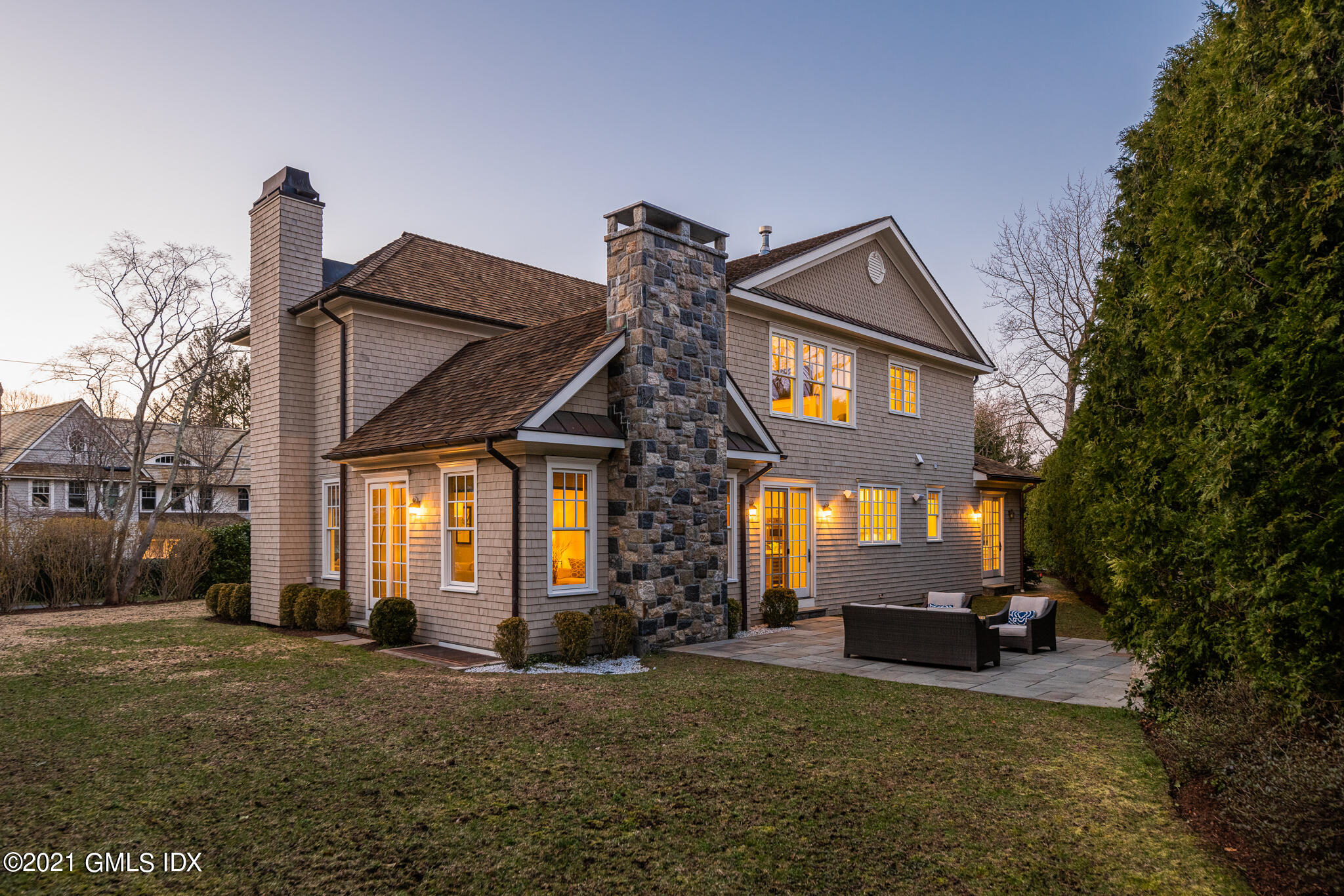 5 Gilliam Lane Riverside, CT 06878 - Photo 37 of 46 a front view of a house with a yard