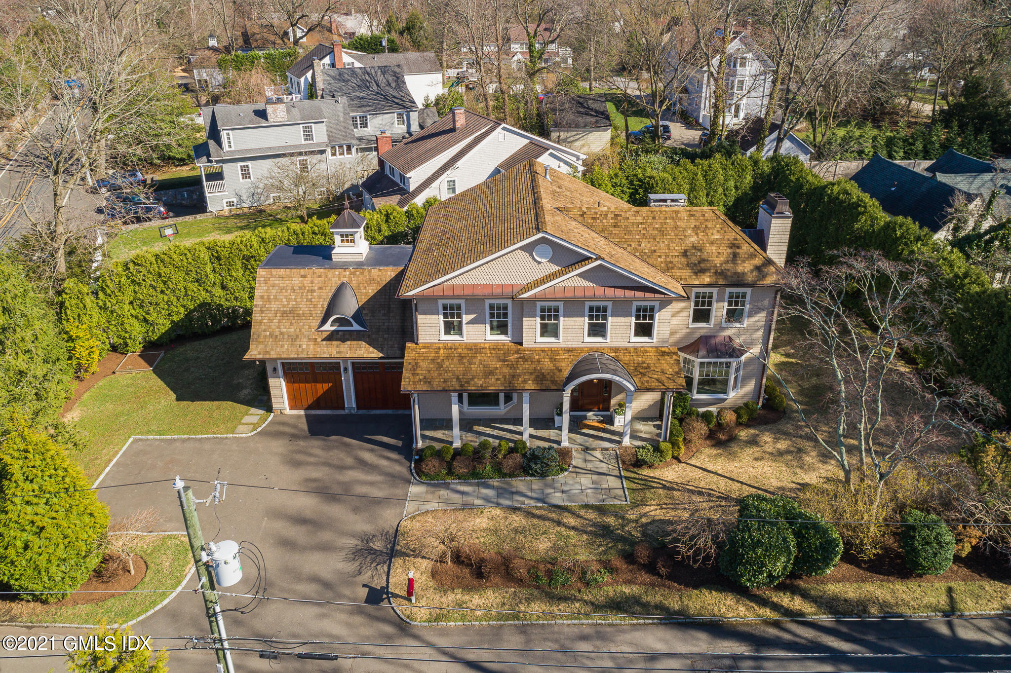 5 Gilliam Lane Riverside, CT 06878 - Photo 38 of 46 an aerial view of a house with swimming pool and sitting area