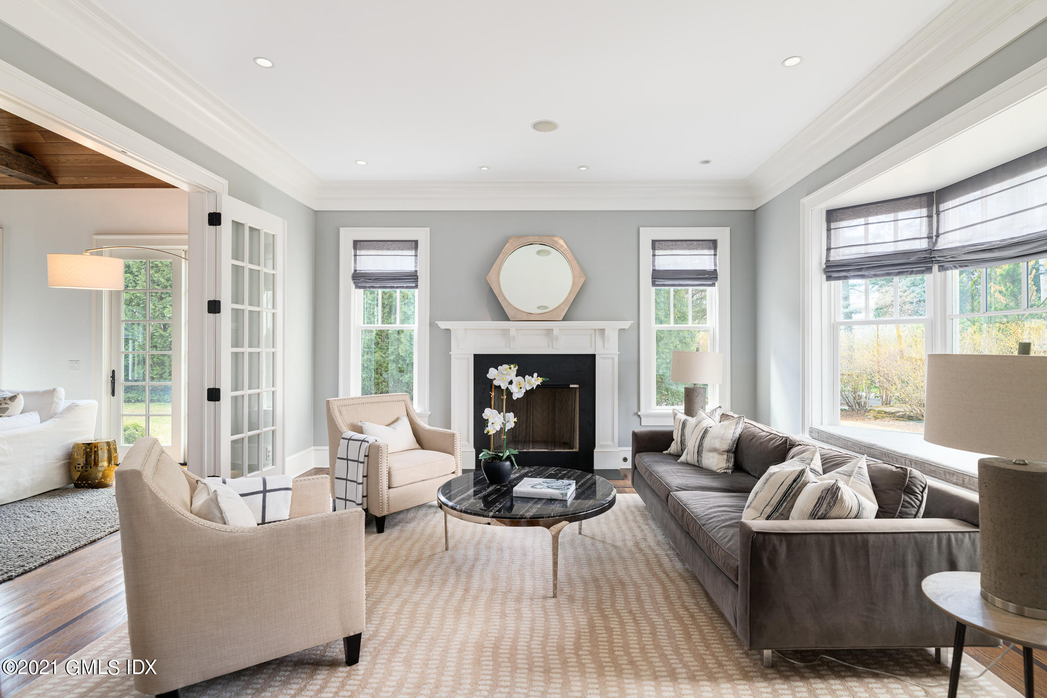 5 Gilliam Lane Riverside, CT 06878 - Photo 5 of 46 a living room with furniture and a fireplace