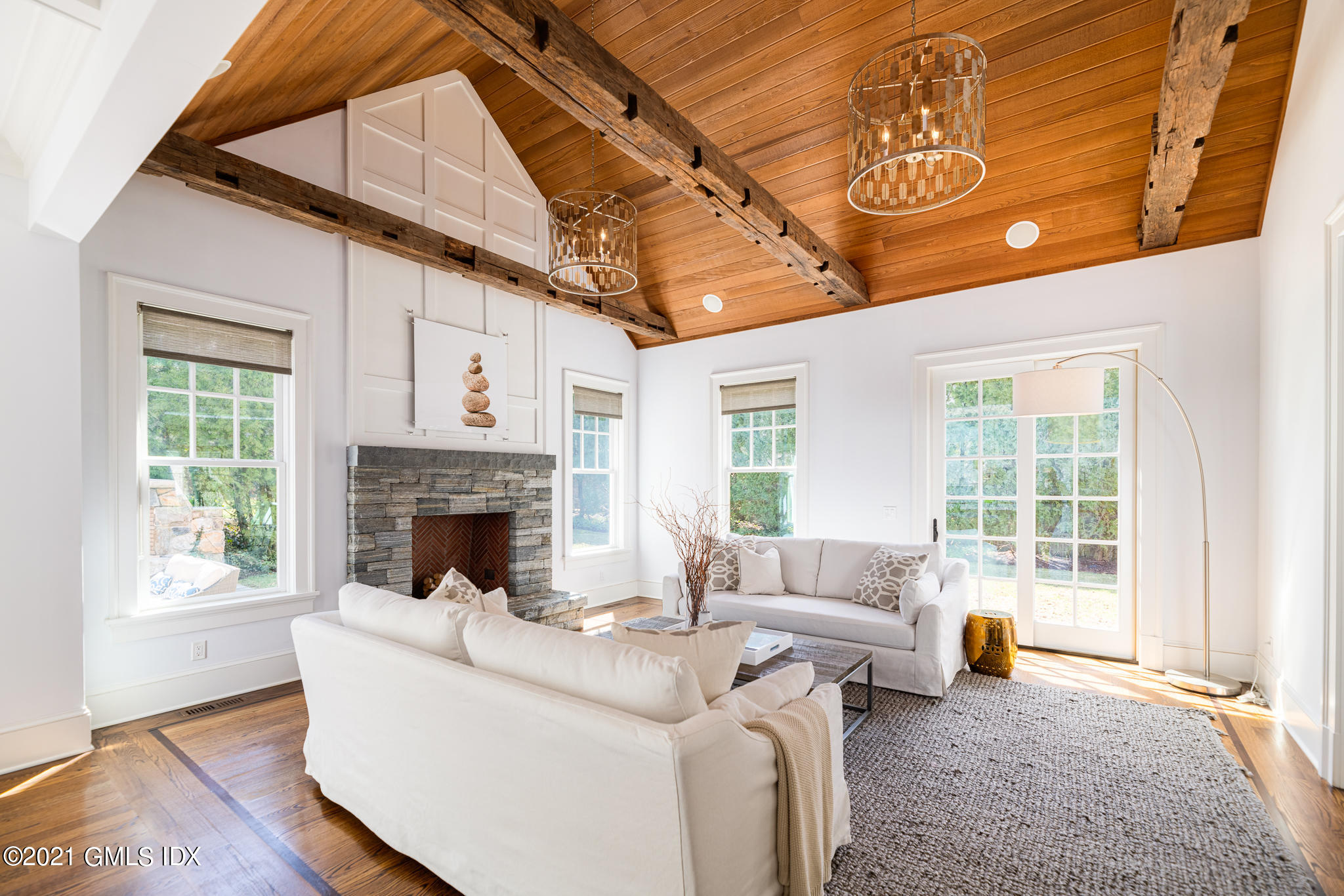 5 Gilliam Lane Riverside, CT 06878 - Photo 9 of 46 a living room with furniture and a fireplace