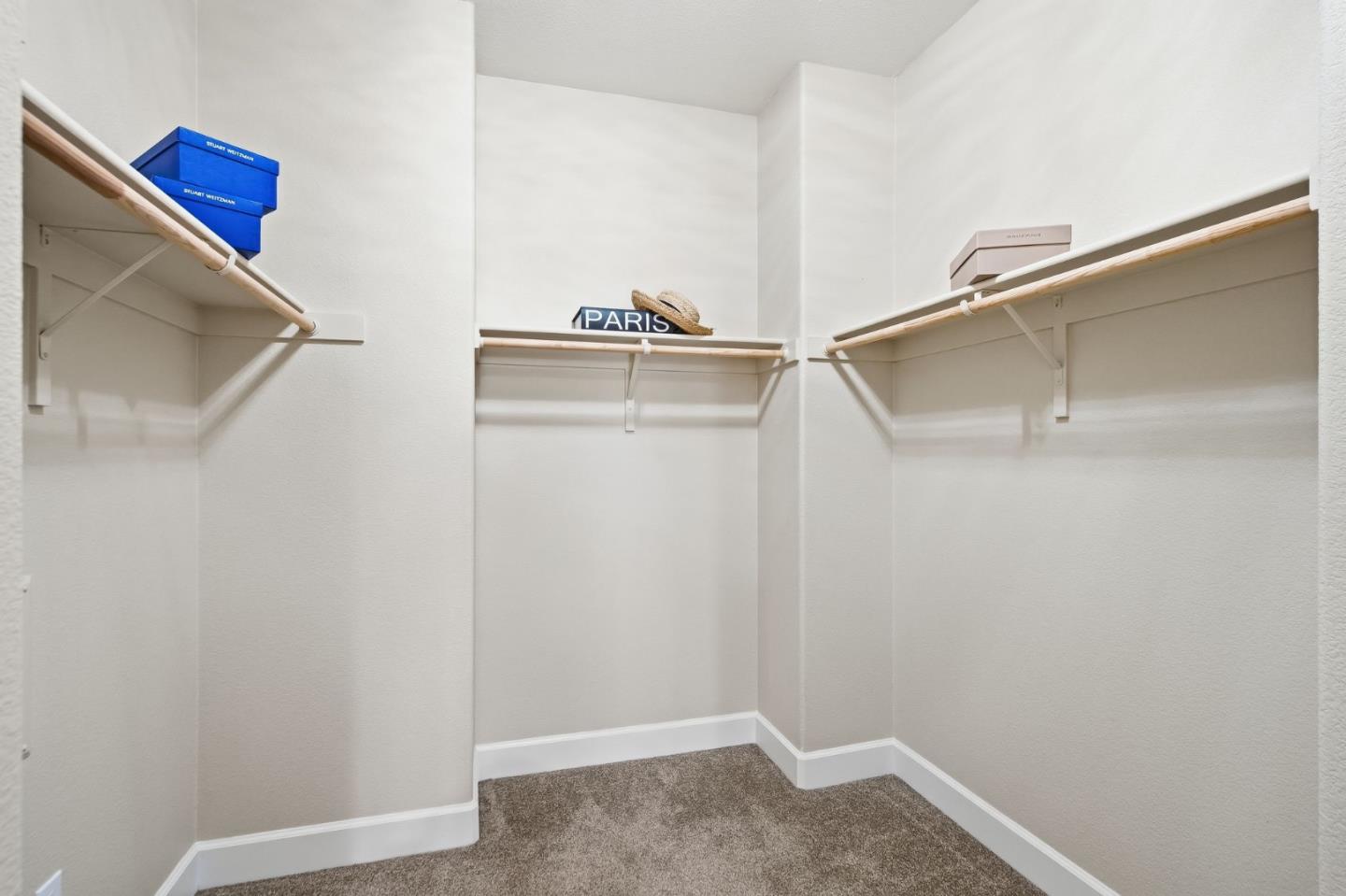 478 Rialto Place San Jose, CA 95128 - Photo 14 of 26 a view of a room with racks on the wall