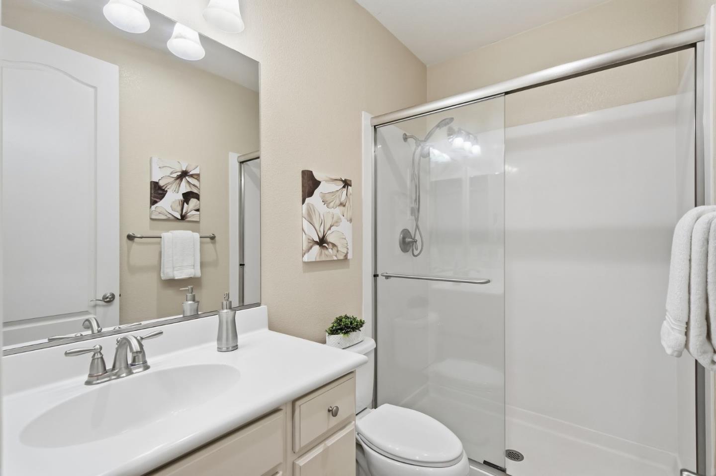 478 Rialto Place San Jose, CA 95128 - Photo 10 of 26 a bathroom with a sink toilet and shower