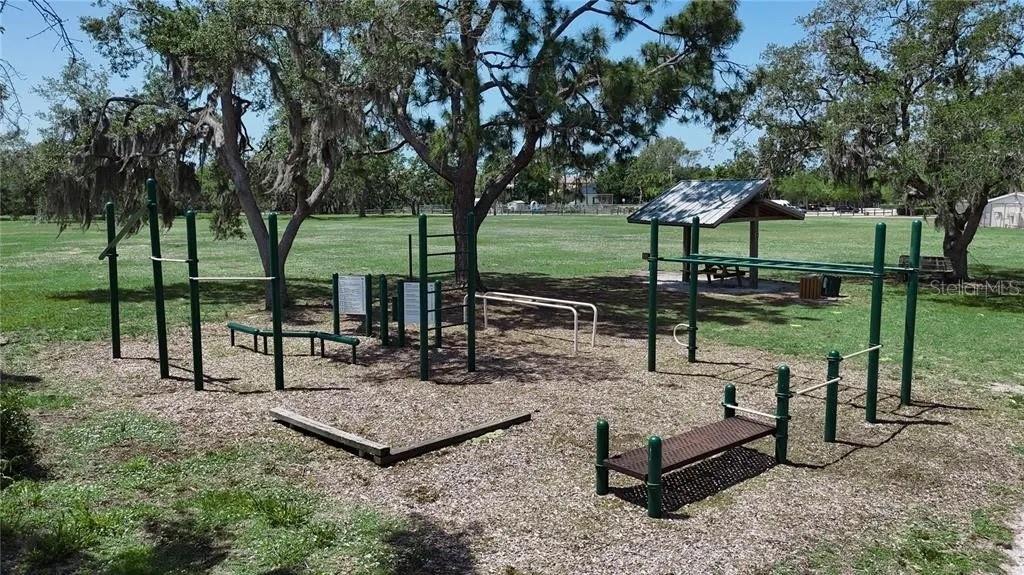 Colonia Lane Nokomis, FL 34275 - Photo 14 of 15 a view of a park with large trees